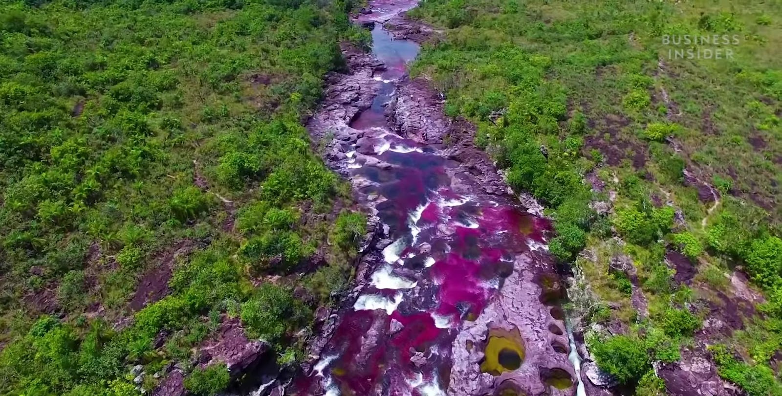 Rainbow River In Colombia drone view